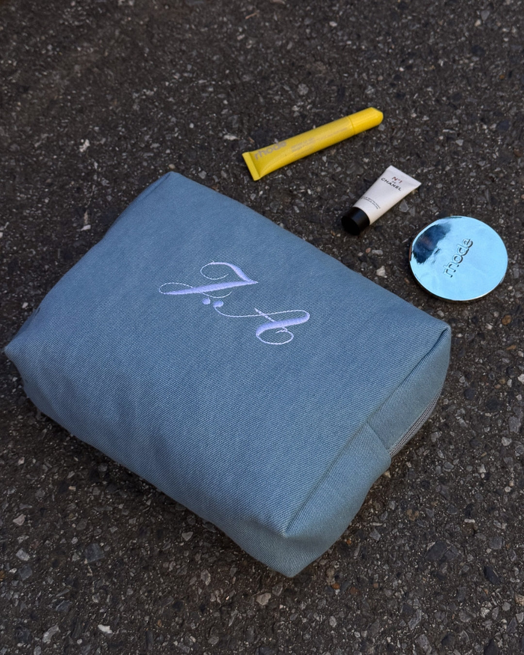 Blue pouch with monogram
